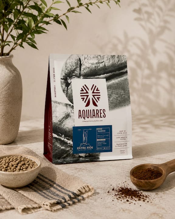Aquiares Entre Ríos 100% Arabica Costa Rican coffee, regenerative and shade-grown, displayed with ground coffee and natural styling.